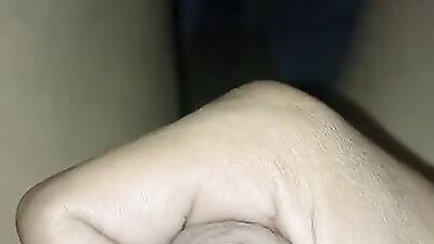 Close-up video of a chap jerking his tiny pecker