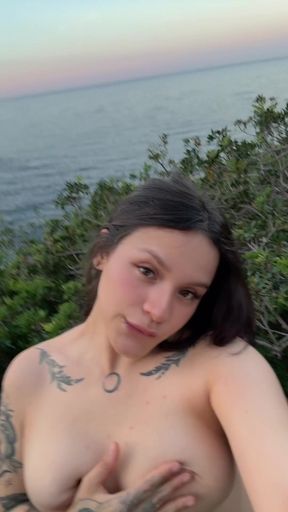 Tattooed teen shows off her ink outdoors