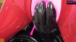 Latex doll masturbates in full latex