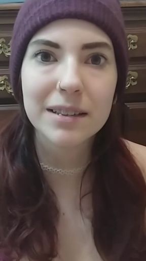 Woman in maroon beanie