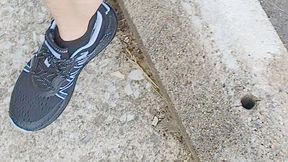 Tempest walking in blue sneakers