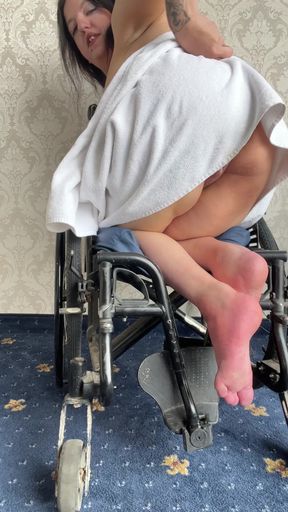 Woman sitting in wheelchair