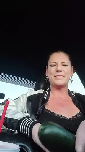 MILF Masturbates and Squirts with Huge Cucumber in Grocery Store Parking Lot