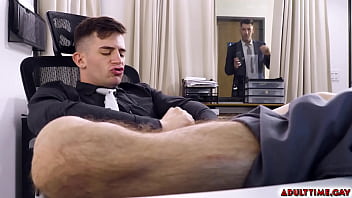 Trevor Brooks masturbates while working in the office, fapping his dick unaware that his boss, Jordan Star catches him in the act.