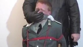 chairtied army officer gagged