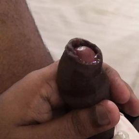 Playing with my uncut cock while cross-dressed