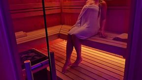 Blonde bombshell rides gigantic cock in public sauna