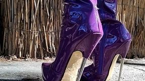ANIA - Purple shiny patent leather boots in action