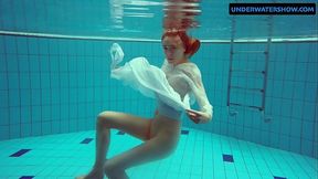 Redhead Diana hot and horny in a white dress