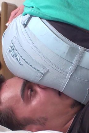 Watching TV sitting on slave's face