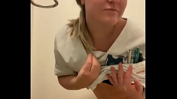 Nurse showing her body during break