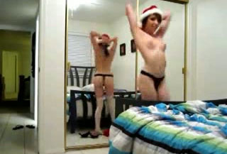 Skanky brunette gf gives me strip dance in Xmas hat and negligee