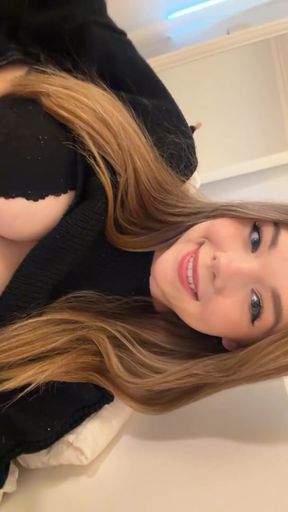 Smiling girl in black sweater