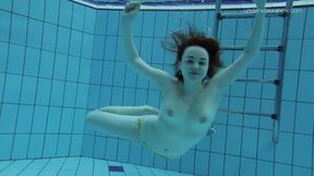 Shaved beauty Lada Poleshuk parades off big tits underwater