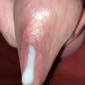 Dripping cumshot out of long foreskin after edging