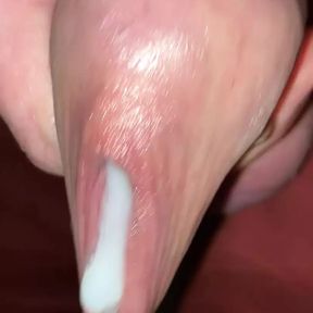 Dripping cumshot out of long foreskin after edging