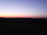 GF pissing behind the barn at sunset