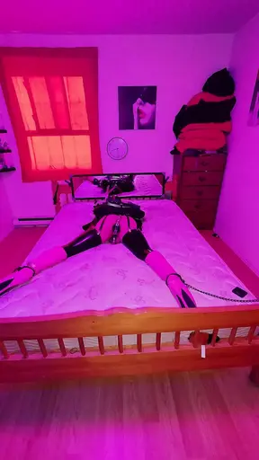 Sissy Maid in Armbinder and Ankle Cuffed to bed in Chastity