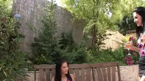 Two sexy brunettes make out and finger their friend's pussy