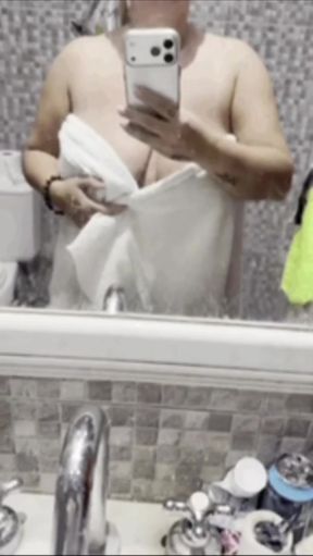 Busty babe shows off her big tits