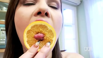 Getting herself orange juicy!