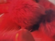 Red fluffy devil with a big uncut cock fills the mirror with cum