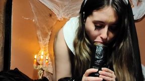 Nun sucking huge dildo