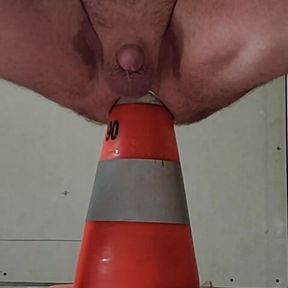 I sit on a construction cone