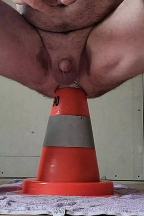 I sit on a construction cone