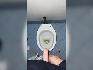 a young dude went into a bawdy public throne-room to pee and jack off