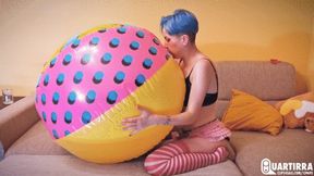 Q777 Stashia blows, rides and deflates big colorful beachball - 1080p