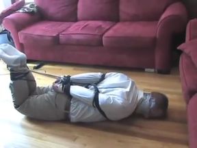 BG Beefy stud hogtied gagged and blindfolded struggling