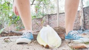 Pee in nature inside the Coconut flower shell