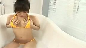 Divine Japanese babe Gekichaku Idol rubs herself with foam while taking a bath