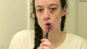 black eye tooth brushing in braids