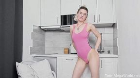 Naughty young housewife is playing with her favorite sex toy in the kitchen