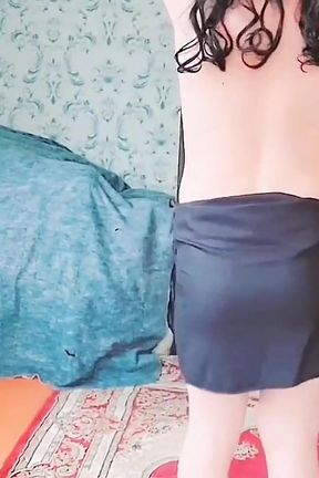 Playful Sissy Sitting Sideways on Big Fluffy Chair