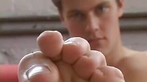 Handsome beyond belief Andre parades his body and feet solo