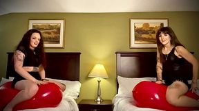 Two hot looners ride and bounce to pop giant balloons