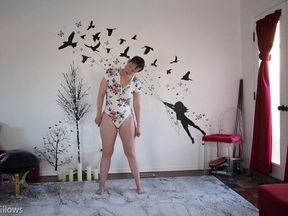 Goddess Aurora Willows Stretching in Hot Bodysuit