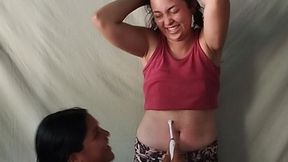 Tickle Paola's navel