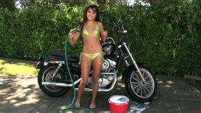 Turned On chick Michelle Maylene washing her bike