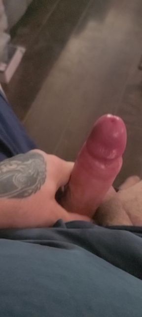Chubby man with thick uncut cock indulges in solo masturbation