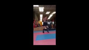 ada love kick doing sparring demostration with her high kicks with her friend