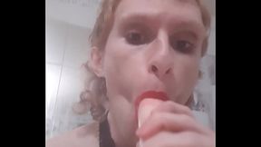 Femboy twink loves giving a sloppy blowjob to a big dildo