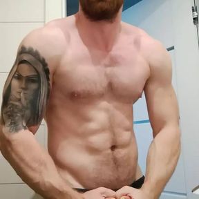 Muscular fitness guy is doing muscle worship and later jerking off