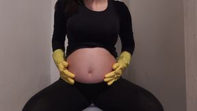 My pregnant Indian MILF big ass wife sits on the toilet with gloves on and masturbates until orgasm