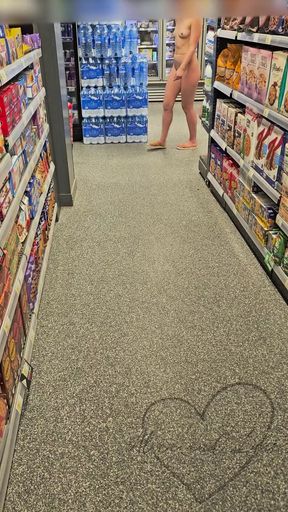 Woman in convenience store aisle