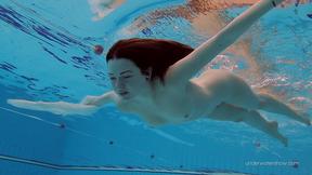 ”Tight brunette Russian babe Katy Soroka swims”