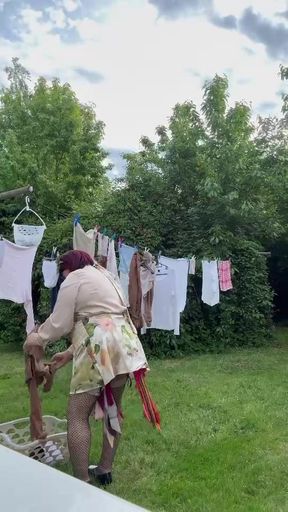 Dressed in a little dress to pick up the laundry